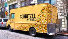 a schnitzel st things truck is parked on the side of the street