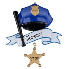 a blue police hat and star shaped keychain with the words jersey year on it