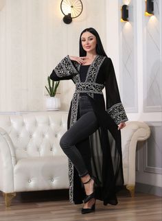 Introducing the Arabic Letter Embroidered Cardigan:This cardigan boasts beautifully embroidered Arabic letters, adding an elegant touch and cultural flair to your wardrobe. High-Quality Material:Crafted from premium materials, it provides both style and comfort, ensuring a luxurious feel for all-day wear. Perfect for Any Occasion:Whether for casual outings or formal events, this cardigan is a must-have for those looking to add a unique cultural element to their outfits. Elegant and Unique Design Arabic Letters, Kaftan Abaya, Embroidery On Clothes, Embroidered Cardigan, Formal Event, Plus Size Dresses, Bridal Dresses, Unique Design, Unique Designs