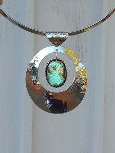 WANTED all over the Universe. Turquoise is recognized Sought After by early KINGS, MOVERS, and SHAKERS! Turquoise is said to be a vessel Imbued with energies associated with Heaven! All My Turquoise is Carefully chosen from around the World. I love the Raw Authentic look and feel of the stone...so I do not over polish the Turquoise! True Bohemian Style...an Original work of Art that you can treasure for a lifetime! Each of My Creations are One of A Kind and are Hand wrought to bring out the best Silver Turquoise Western Necklace For Festivals, Southwestern Silver Turquoise Necklace For Festival, Bohemian Hand Forged Turquoise Necklace, Southwestern Silver Turquoise Necklace With Patina, Bohemian Sterling Silver Turquoise Necklace With Patina, Handmade Western Silver Turquoise Necklace, Bohemian Silver Turquoise Necklace Soldered, Bohemian Silver Turquoise Oval Pendant Necklace, Silver Bohemian Turquoise Necklace, Soldered