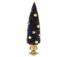 a blue and gold christmas tree with balls on it's top, in front of a white background