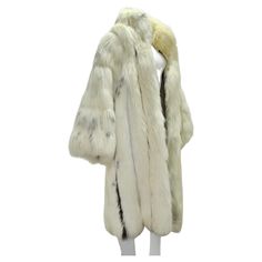 Do not miss out on this breath taking 1970s Christian Dior fur coat! The most luxurious and dramatic classic fur coat in an elegant ivory fox fur. Look closely and notice the deep brown stripes throughout, this is such a chic detail that really takes this coat to the next level. Classic extra cozy and mid length, you can’t ever go wrong with this style. The fur is so soft and luxurious, you have to feel it to believe it. Style this for an evening out with an Hermes handbag, some Chanel gloves an Dior Fur Coat, Chanel Gloves, Fur Outfit, Dior Clothing, Dramatic Classic, Fox Fur Coat, Louis Vuitton Boots, Hermes Handbags, Deep Brown