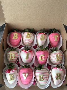 chocolate covered strawberries are in a box with the letters b and f on them