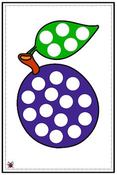 a purple and green apple with polka dots on it's side, next to a leaf