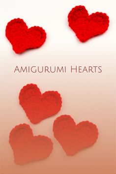 three red crocheted hearts with the words amigurum hearts written below them