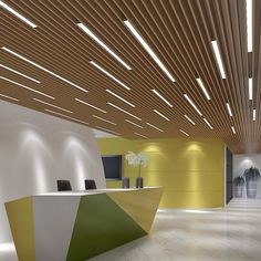 the interior of a modern office with yellow and green accents on the walls, wood ceilinging