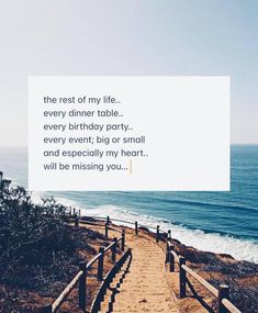 a wooden path leading to the beach with a quote on it that reads, the rest of my life every dinner table