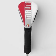 a red and white golf club headcover on a metal tee with the word putt up printed on it