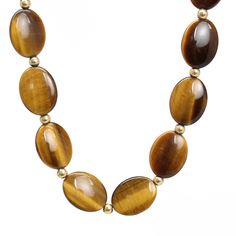 "Vintage Tigers Eye Oval Bead Necklace for Women, 24\" Long. The findings are gold color, the clasp is stamped 925. The beads are strung on a tiny chain. It's a beautiful old necklace. It's hard to find Tiger's Eye beads in this shape and size in such a nice quality. Genuine Tigers Eyes Beads Beads are about 3/4\" x 2/8\" 24\" Long Gold Tone Clasp Marked 925 Vintage I found this in an estate sale. It is a used item. It does show some signs of wear consistent with its age. Please inspect photos c Classic Gold Necklace With Gemstone Beads, Gold Beaded Necklace With Oval Gemstone Beads, Classic Gold Hand-strung Necklace, Adjustable Gold Necklace With Oval Beads, Gold Adjustable Necklace With Oval Beads, Gold Necklaces With Oval Beads, Gold Oval Gemstone Beads Jewelry, Brown Oval Polished Bead Jewelry, Gold Oval Jewelry With Gemstone Beads