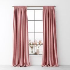 a pink curtain hanging in front of a window with a vase on the windowsill