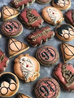 harry potter themed cookies are arranged on a table