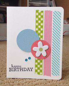 a close up of a birthday card with a flower on the front and a balloon on the back