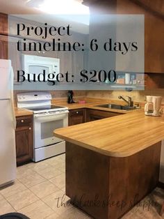 a kitchen with an island in the middle and text overlay that reads project time 6 days budget $ 200