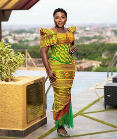 Kente Dress Collection with beautiful designs and colors made with top quality Kente cloth for a Royal look and experience made by Marrying Ghana Kente. Your in Good hands With the World's #1 Kente Cloth Exporter. Recommend that each client send there personal measurements for optimum fit. Kente comes from the word kenten, which means basket in the Asante dialect of Akan. Akans refer to kente as nwentoma, meaning woven cloth. It is an Akan royal and sacred cloth worn only in times of extreme imp African Kente Styles For Engagement, Kente Short Dress Styles Ghana, Kente Dress Styles For Graduation, Ghana Kente Styles, Kente Styles For Engagement Ghana, Ghana Clothes, Modern African Clothing, Wedding Event Dresses, Kente Dress