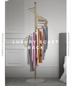 the luxury scarf rack is on display in a white room