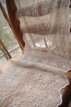 an image of white lace on the table