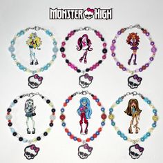 a bunch of bracelets with cartoon characters on them and beaded necklaces around them