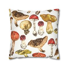 a white pillow with mushrooms on it