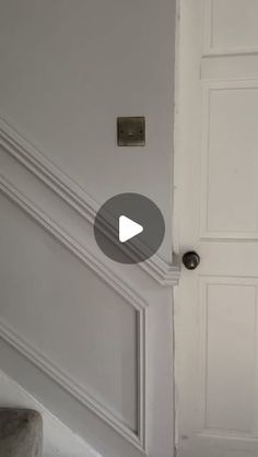 a white door with a black handle on it