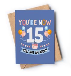 a blue birthday card with the words you're now 15 still not an adult