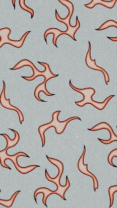 an orange and black fire pattern on a gray background