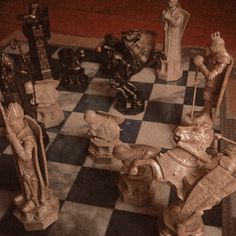 a chess board with figurines on it