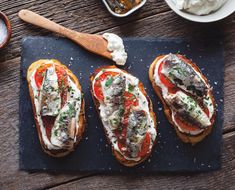 three pieces of bread with different types of toppings