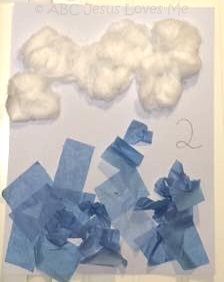 a card with blue bows and clouds on it