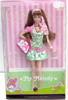 a barbie doll in a pink and green dress holding a purse with hello kitty on it