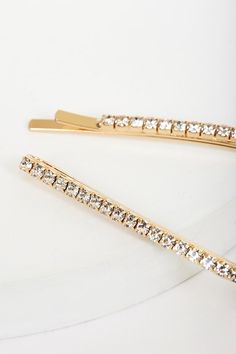 No LBD is complete without the finishing touch of the Lulus So Polished Gold Rhinestone Hair Pin Set! This set features two shiny gold bobby pin-style hairpins embellished with a single row of silver rhinestones in gold square settings. Pins measure 3. 5" long. Man made materials. Imported. Lulus | So Polished Gold Rhinestone Hair Pin Set. Gold Bobby Pins, Diamond Hair Pins, Rhinestone Hair Pin, Rhinestone Hair, Bobby Pin, Crystal Design, Gold Rhinestone, Silver Rhinestone, Hair Pin