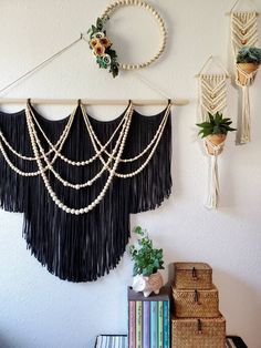 the wall hangings are decorated with beads and other decorative items, including bookshelves