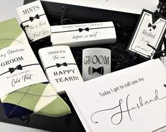 the grooms gift box is filled with personalized socks and gifts for him or her