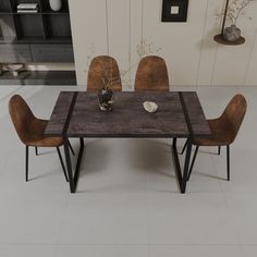 a dining table with two chairs next to it