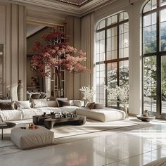 an elegant living room with large windows and white furniture