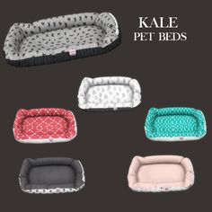 four dog beds with different colors and patterns on them, including one for the cat