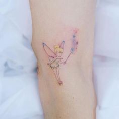 28 Hottest Tinker Bell Tattoo Ideas and Designs Bell Tattoo Ideas, Bell Tattoo, Tinker Bell Tattoo, Belle Tattoo, Turtle Tattoo Designs, Princess Tattoo, Magic Tattoo, Red Ink Tattoos, Wrist Tattoos For Women