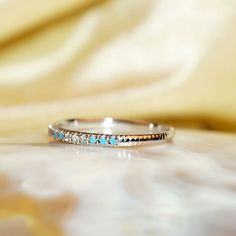 Silver Turquoise Ring For Wedding, Turquoise Toe Ring Jewelry For Anniversary, Wedding Stackable Turquoise Ring In Sterling Silver, Turquoise Round Band Promise Ring, Sterling Silver Stackable Turquoise Ring For Wedding, Stackable Sterling Silver Turquoise Ring For Wedding, Blue Turquoise Ring With Diamond Accents For Wedding, Blue Turquoise Ring For Anniversary, Dainty Style, Turquoise Jewelry Ring With Diamond Accents