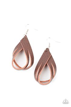 pair of brown leather earrings on white background