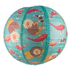 a blue paper lantern with fish and flowers on the inside, hanging from a string