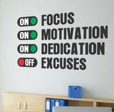 a wall decal with the words focus on motivation, dedication, and excusses