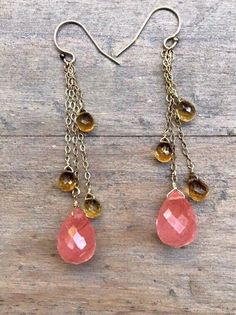 Long Pink Cherry Quartz Madeira Citrine 14k gold fill dangles earrings.  Gemstone jewelry.  Artisan gifts.  You will get the same as on the photos earrings.Soft and feminine, dainty earrings are made of Cherry Quartz faceted gems wire wrapped to handmade 14kt gold fill handmade French style earwires.  Simple, romantic, minimalist style. The earrings measure 2.5 inches long.  Each cherry quartz briolette is 12 x 10 mm.  Each natural Madeira Citrine briolette is 7x5 mm. The earrings will come in a Handmade Gold Briolette Jewelry, Handmade 14k Gold Drop Jewelry, Handmade Rose Gold Drop Jewelry, Dainty Briolette Earrings Handmade, Handmade 14k Gold Drop Earrings, Dainty Handmade Briolette Earrings, Romantic Minimalist Style, Gold Briolette Fusion Earrings, Handmade Yellow Gold Briolette Earrings