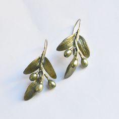 Olive Leaf Drop Earrings - Goldmakers Fine Jewelry Green Oxidized Finish Earrings For Gift, Elegant Green Earrings With Oxidized Finish, Unique Hand Forged Green Earrings, Green Earrings With Oxidized Finish, Unique Green Earrings With Oxidized Finish, Green Oxidized Drop Earrings, Green Brass Earrings Nature-inspired, Hand Forged Green Earrings For Gift, Hand Forged Bronze Nature-inspired Earrings