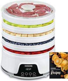 an electric food dehydrator with five sections stacked on each side and four different fruits in the middle