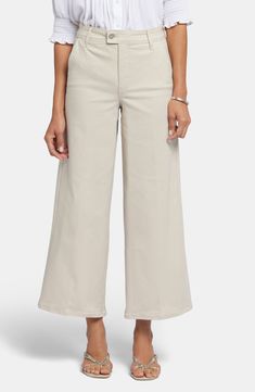 A trendy work-to-weekend style, these wide-leg trouser jeans feature ankle-length hems, a hint of stretch and Lift Tuck® Technology that slims the silhouette. 27" inseam; 25" leg opening; 11" front rise; 16" back rise (size 8) Zip fly with button-tab closure Front slant pockets; back welt pockets 88% cotton, 10% polyester, 2% elastane Machine wash, line dry Imported Spring Wide Leg Jeans For Workwear, Spring Wide-leg Jeans For Workwear, Fall Wide-leg Cropped Jeans, Wide-leg Cropped Jeans For Spring Workwear, Spring Workwear Cropped Wide-leg Jeans, Spring Workwear Wide-leg Cropped Jeans, Spring Wide-leg Cropped Jeans For Workwear, Trendy Wide-leg Jeans For Business Casual, Trendy Wide Leg Jeans For Business Casual