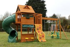 a wooden play set with a slide and climbing frame