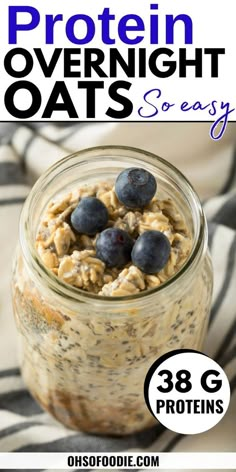 an oatmeal in a glass jar with blueberries on top and the words, protein overnight oats so easy