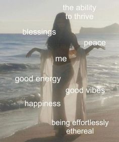 a woman standing on top of a beach next to the ocean with words written in front of her