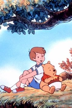 winnie the pooh sitting under a tree with her teddy bear