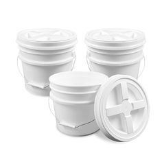 three white plastic buckets with lids on each side and one has a cross in the middle