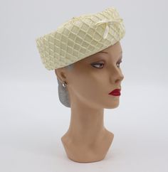 White/cream colored pillbox hat from the 1960s. It is made out of a straw-like material and it has a fabric bow on the front. Great to pair with a formal or vintage-themed outfit. In good vintage condition. Shows signs of wear from age and use, such as discoloration, scratches, staining, small hole and other markings. The hat has a circumference of 21.5". Message me with any questions! White Pillbox Hat, Hat Cream, Elegant Hats, Pillbox Hat, Fabric Bows, Pill Boxes, Themed Outfits, White Cream, White Vintage